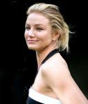 Smiling woman with short blonde hair.