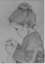A child holding something in his hands.