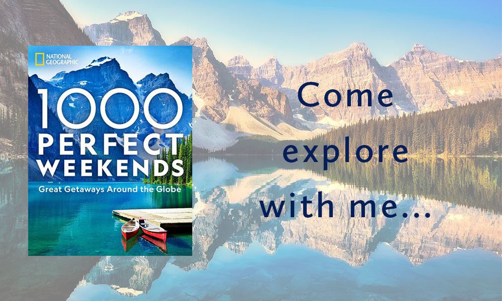 A book cover with mountains and water in the background.